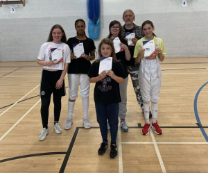 6 fencers are awarded the foil grade 1 certificate.